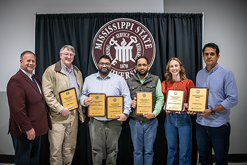 Left to Right: CALS Dean and MAFES Director Scott Willard; Research Professor and Coordinator of the Thad Cochran National Warmwater Aquaculture Center David Wise; Assistant Professor Jagmandeep Dhillon, Department of Plant and Soil Sciences; Ramandeep Kumar Sharma, plant and soil sciences doctoral student; Madeline McKnight, Bachelor of Science in Animal and Dairy Sciences December 2023 and current master’s student and Assistant Professor Vitor Martins, Department of Agricultural and Biological Engineering, were the recipients of the MAFES research awards. (Photo by David Ammon)