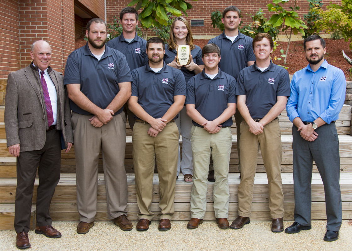 College of Forest Resources Dean George Hopper and SAF Student Chapter Faculty Adviser Robert Grala are pictured with MSU’s student chapter of the Society of American Foresters. Top row, left to right: Austin Gentry, senior representative; Savannah Fenaes, president; Steven Gray, treasurer. Bottom row, left to right: Hopper; Jason Warner, conclave chair; Clayton Cooper, secretary; Daniel Harrison, vice president; William Griffin, junior representative; and Grala. (Photo by David Ammon) 