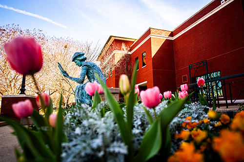 Flowers bloom outside Mitchell Memorial Library