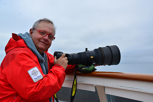 Raul Touzon holds a camera