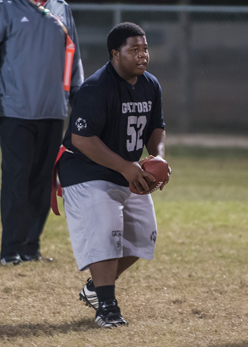 Demarcus Pippens, a Special Olympics athlete from Central Mississippi, gets in some reps at quarterback during a late October practice for the Unified Egg Bowl. The game, a fundraiser for Special Olympics Mississippi, will feature teams from Ole Miss and Mississippi State that will consist of Special Olympics and traditional athletes. Kickoff for this year’s Unified Egg Bowl is set for 5 p.m. Nov. 16 at the University of Mississippi intermural fields in Oxford. (Photo by Mitch Phillips)