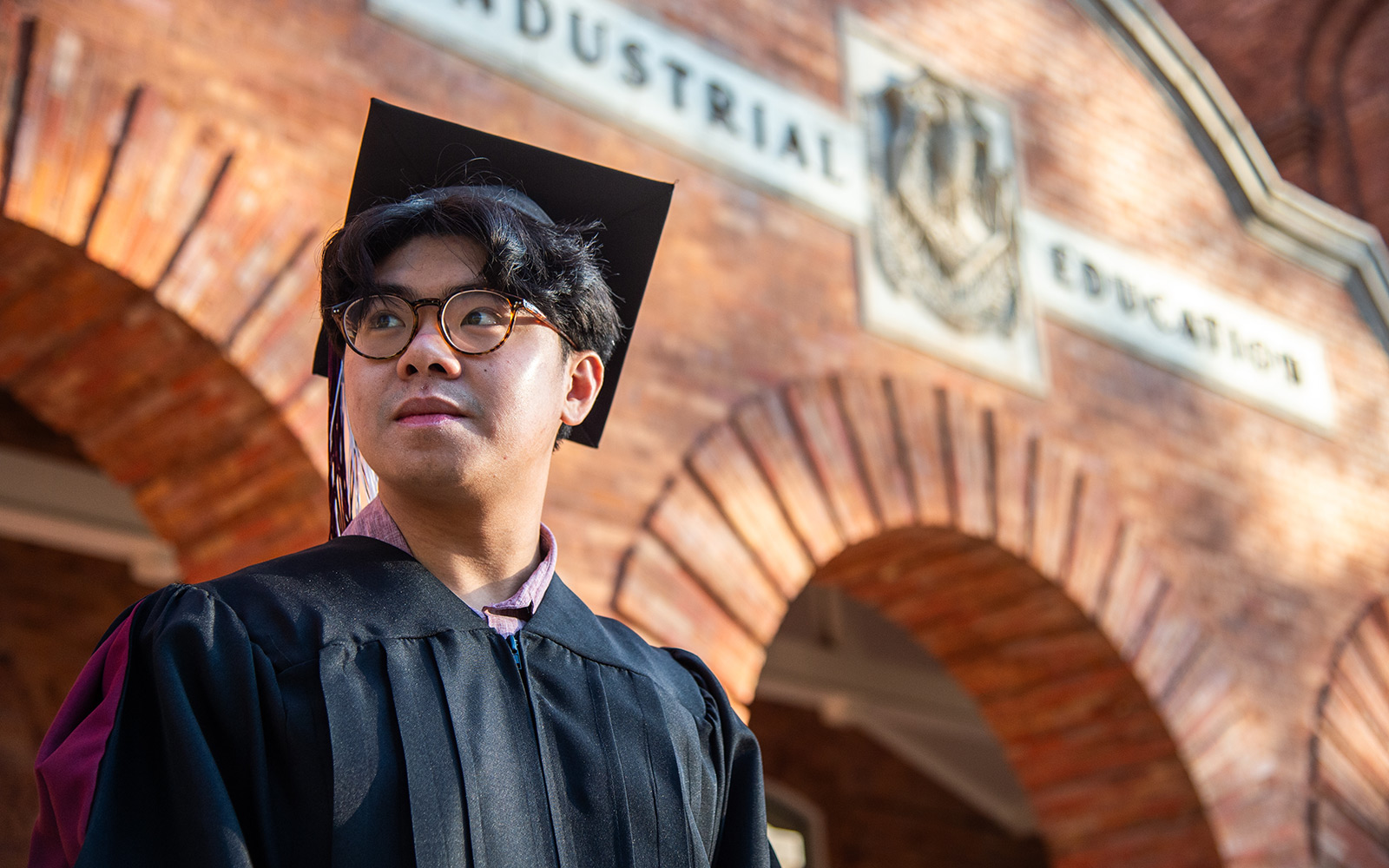 Danny Tran in front of the industrial engineering building