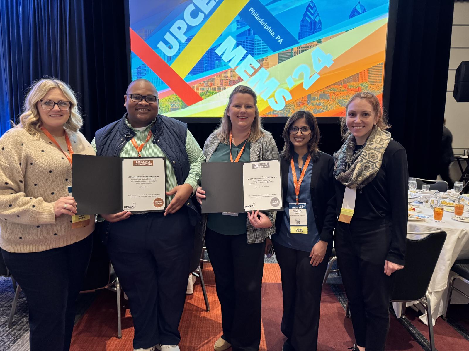 MS State Online won two national marketing awards during the University Professional and Continuing Education Association’s recent competition. From left Samantha Clardy, enrollment and onboarding coach; Mark Jimerson, assistant director of online admissions and enrollment; Tracy Craven, associate director for the Center for Distance Education; Anusha Rijal, retention and engagement coach; and Lily Hudson, academic advisor and success coach. (Submitted photo)