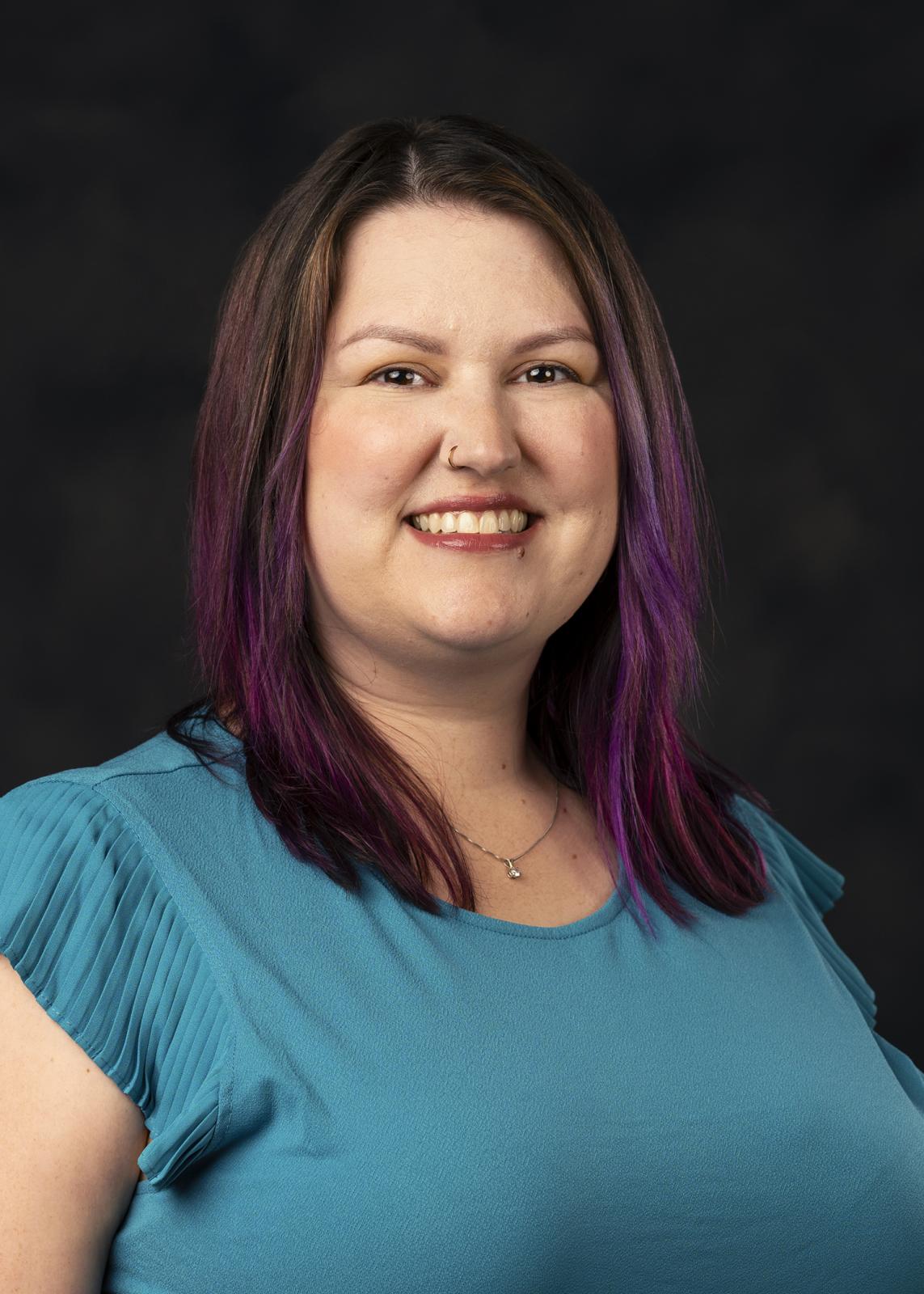 A portrait of Becca Thorn.