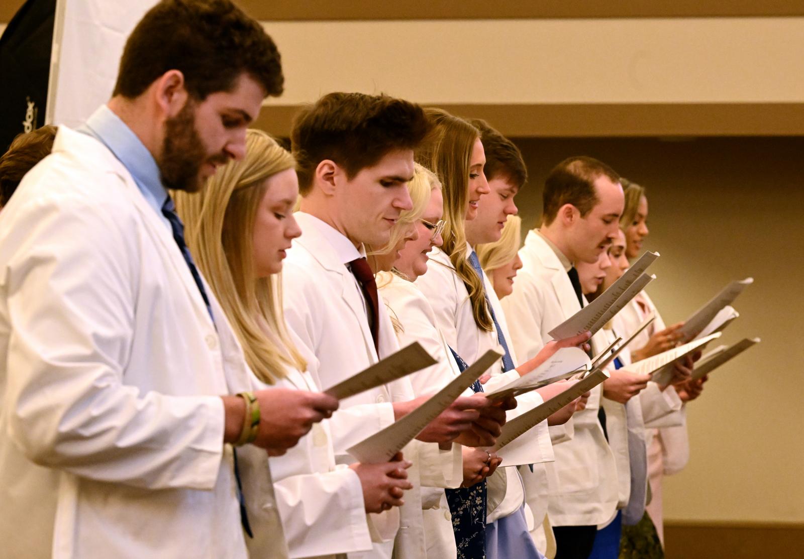 The MSU-Meridian Physician Assistant Studies students receive white coats during a ceremony Thursday [March 13] at the MSU Riley Center