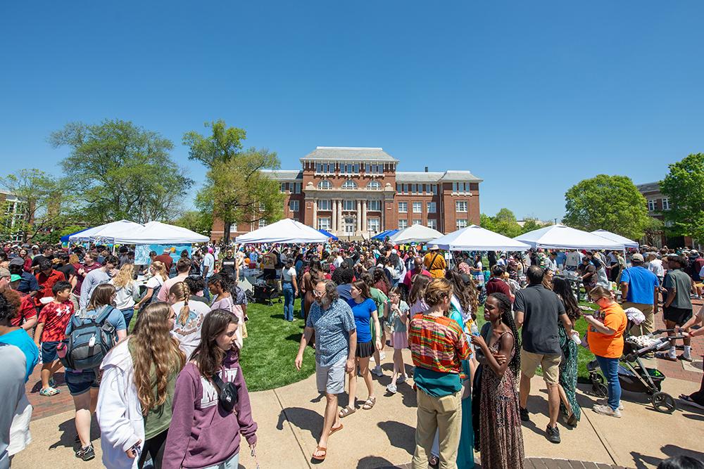 A crowd enjoys MSU's International Fiesta on the Drill Field.