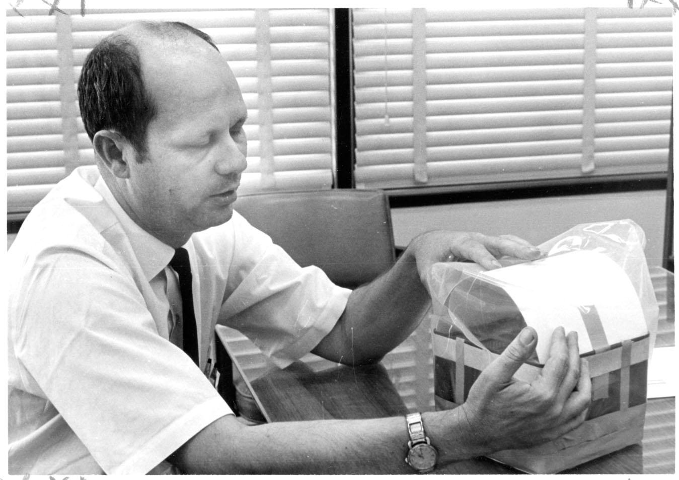 Robert “Ed” Smylie simulates the work he and a team of engineers in NASA’s Mission Control did for the Apollo 13 mission. Smylie, an MSU alumnus, died Monday [April 21].