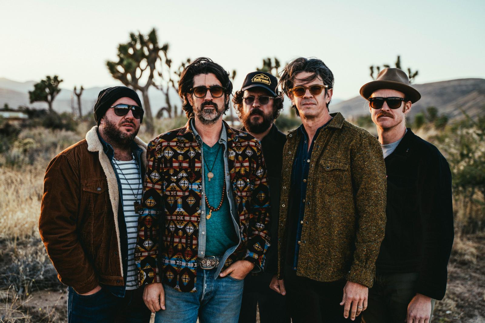five men in desert