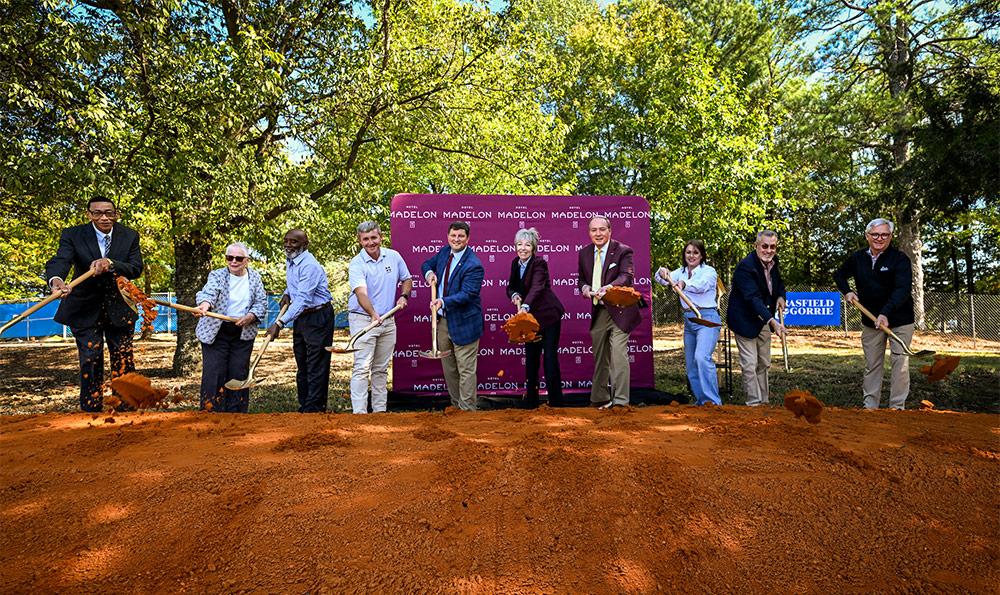 Mississippi State and city of Starkville representatives celebrate the groundbreaking of Hotel Madelon, the 122-room Marriott Tribute Portfolio hotel that will anchor the Crossroads District development between the university and the Cotton District.