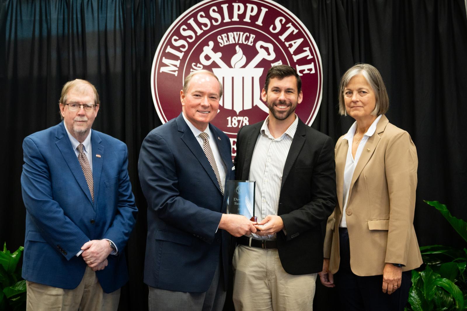 Vice President for DAFVM Keith Coble, MSU President Mark E. Keenum, Research Engineer III David Saucier, and Vice President for Research and Economic Development Julie Jordan