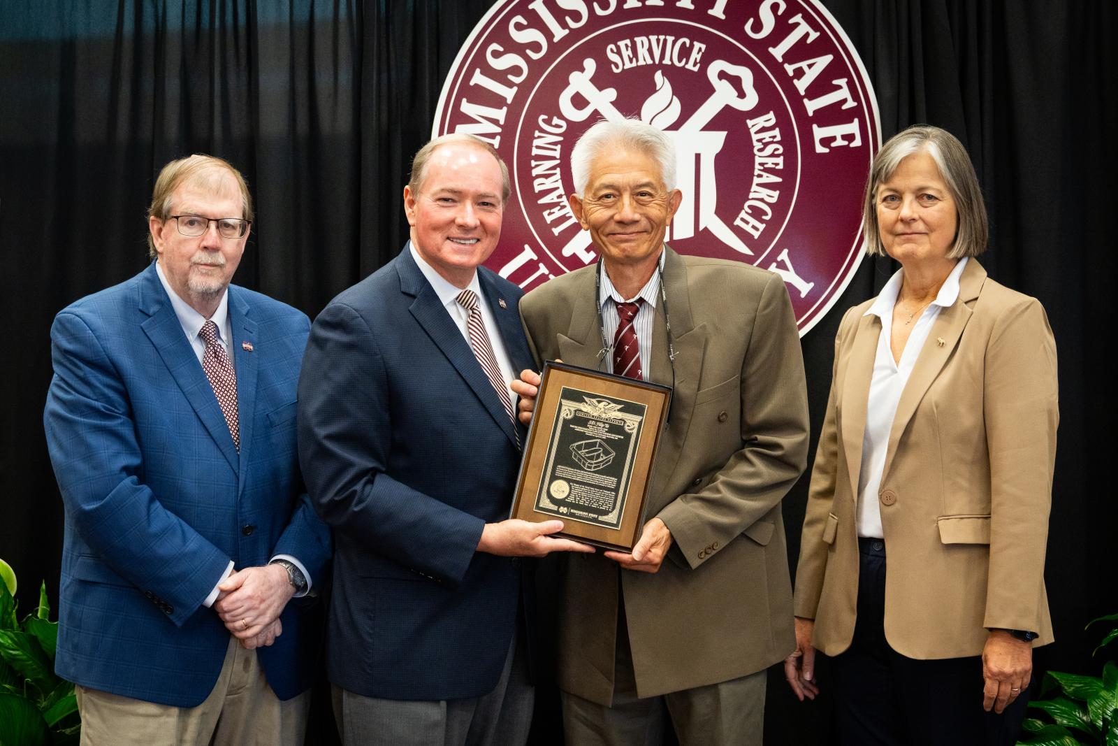Vice President for DAFVM Keith Coble, MSU President Mark E. Keenum, Filip To, Vice President for Research and Economic Development Julie Jordan