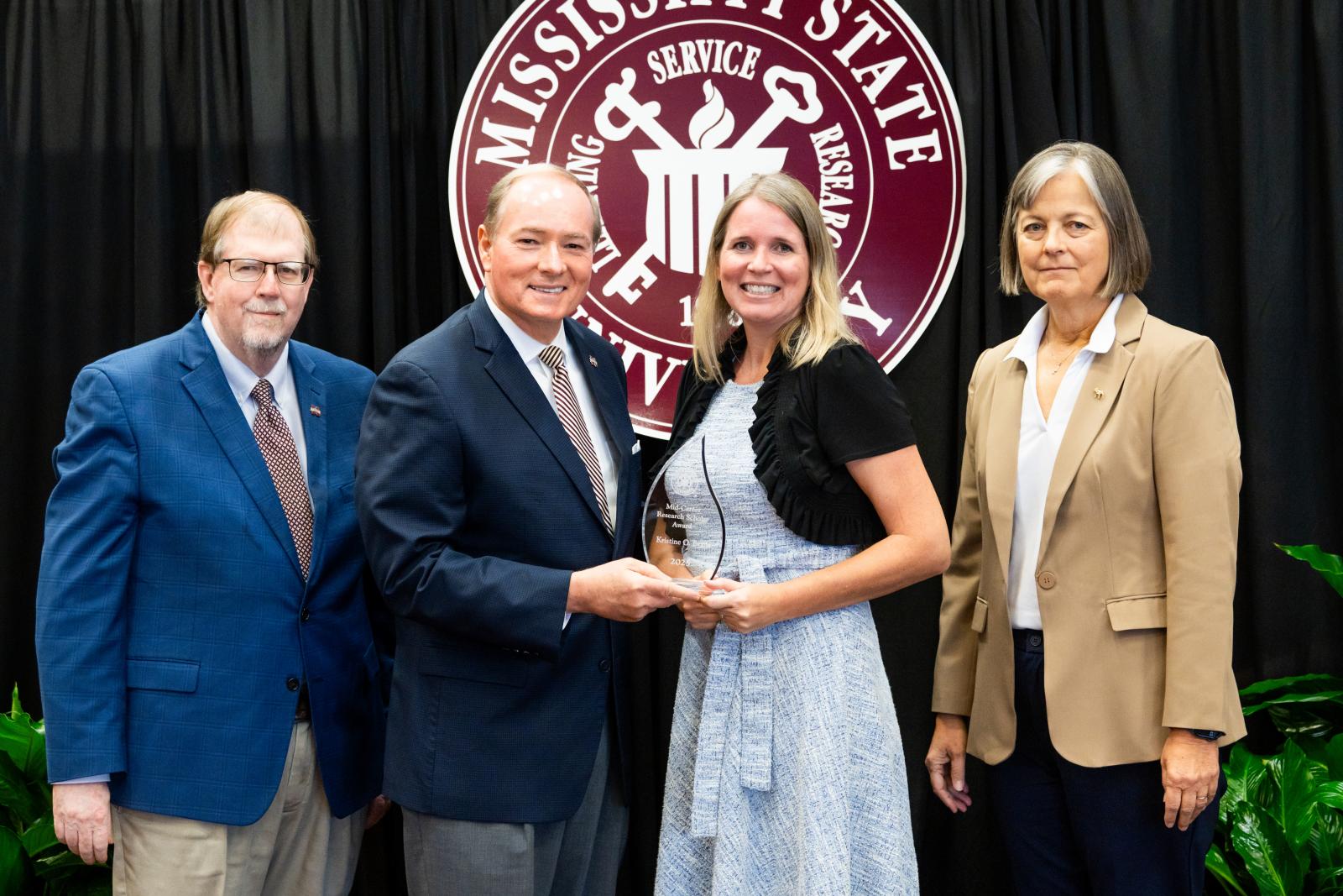 DAFVM VP Keith Coble, MSU President Mark E. Keenum, Associate Professor Kristine Evans, Vice President for Research and Economic Development Julie Jordan