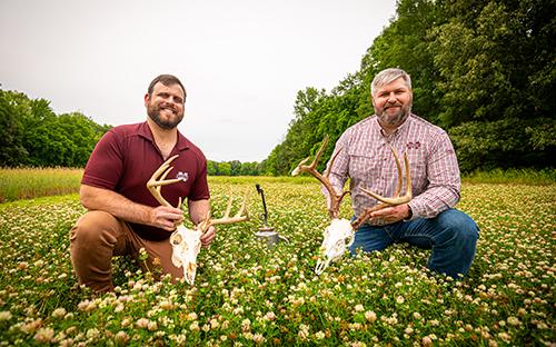 Mississippi State Department of Wildlife, Fisheries and Aquaculture Assistant Professors Eric Michel and Jacob Dykes are pictured in a food plot at MSU’s H.H. Leveck Animal Research Center.