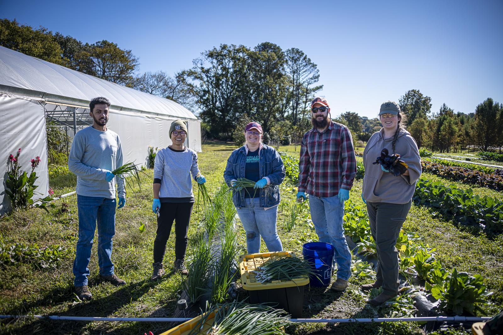 five students in garden
