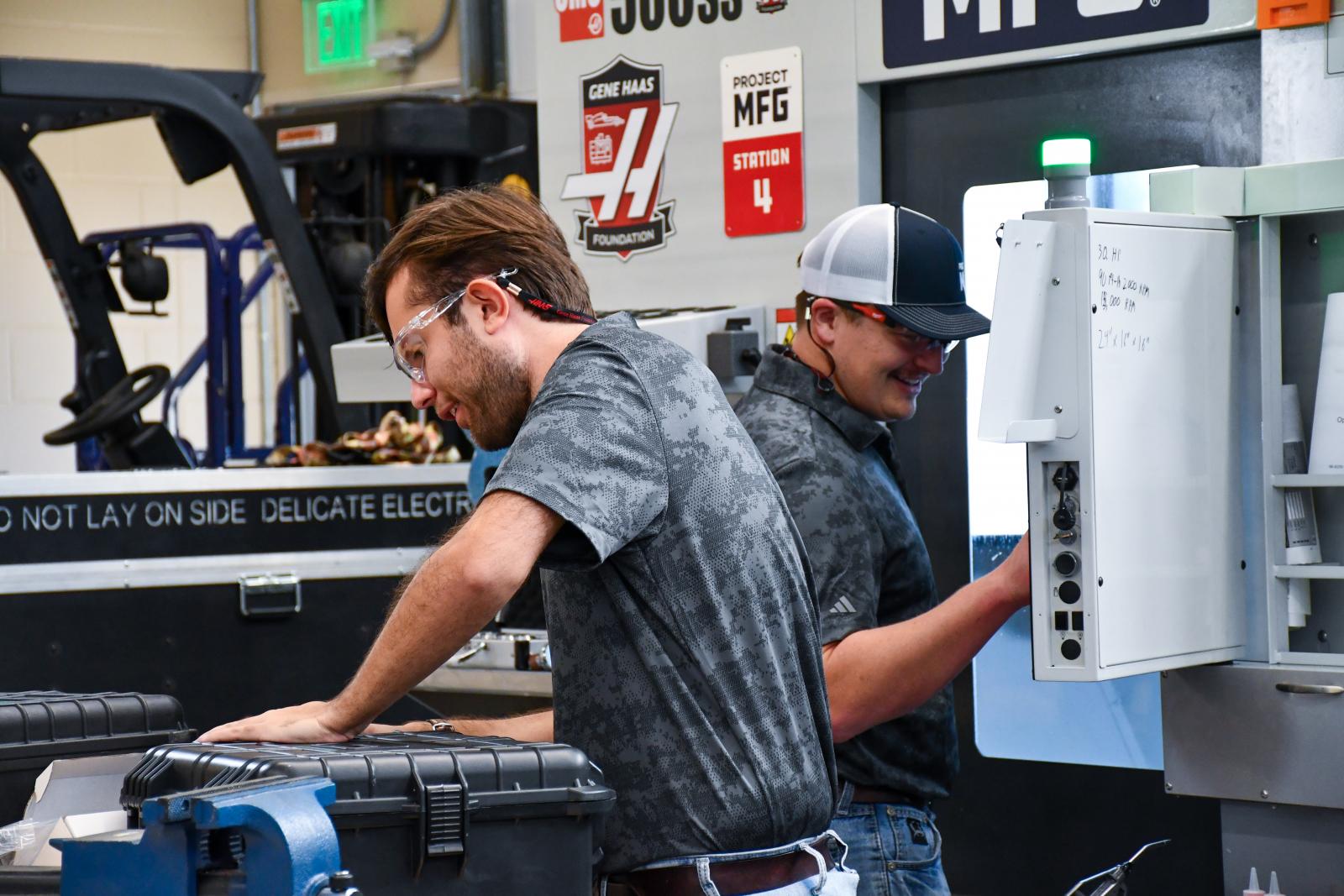young man working on a machine