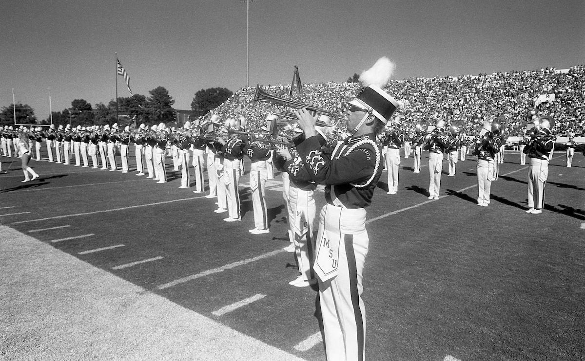 The Mississippi State Famous Maroon Band performs during a 1993 halftime show. The first collegiate marching band in Mississippi to earn the national Sudler Trophy, the FMB is the 2026 winner of the highest honor a collegiate marching band can receive. (MSU Archives