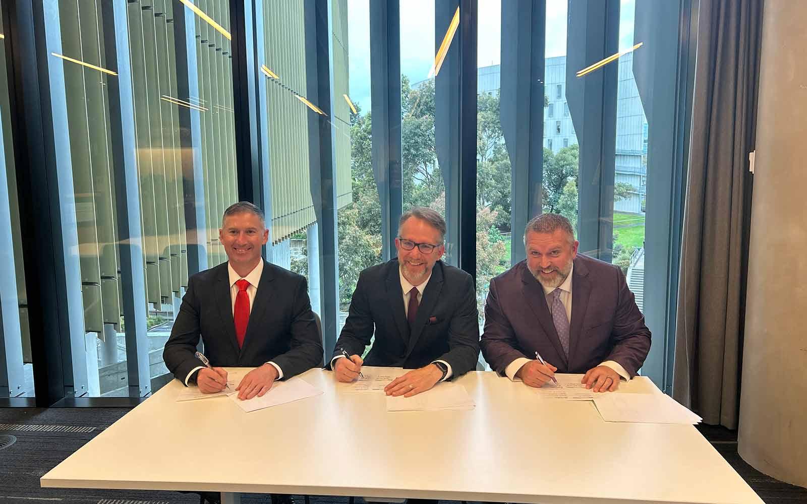 Three men at a table