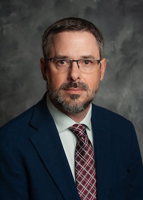 A portrait of John J. Green.