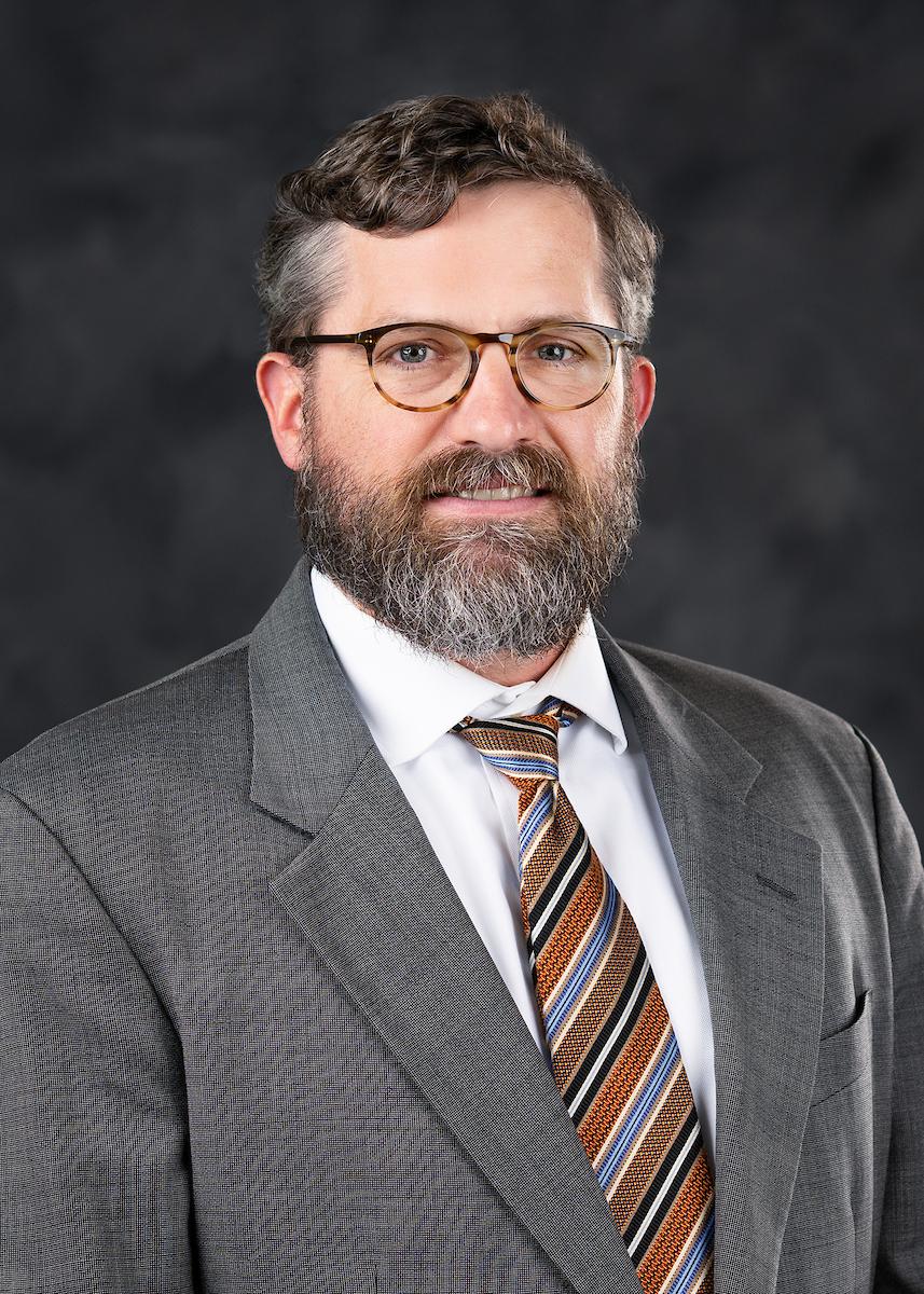 headshot of jason barrett