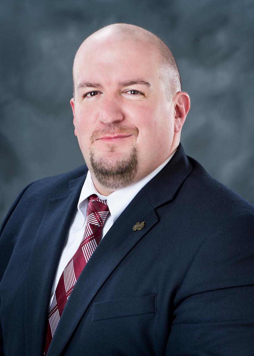 headshot of dallas breen