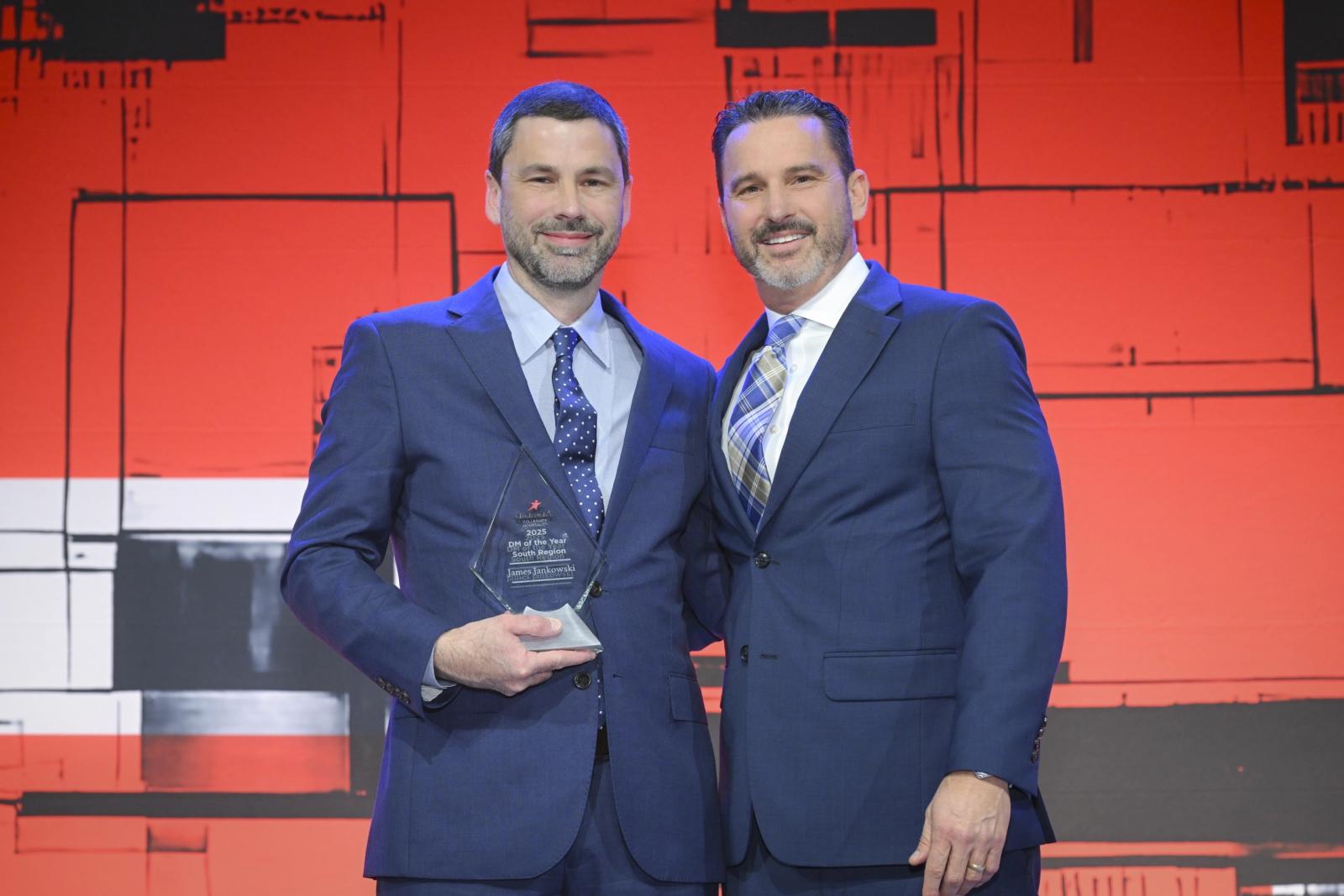 Mississippi State University Dining Services Resident District Manager James Jankowski, left, receives the 2025 Aramark District Manager of the Year award for the South Region from Aramark Regional Vice President of the South Region Todd Robison.