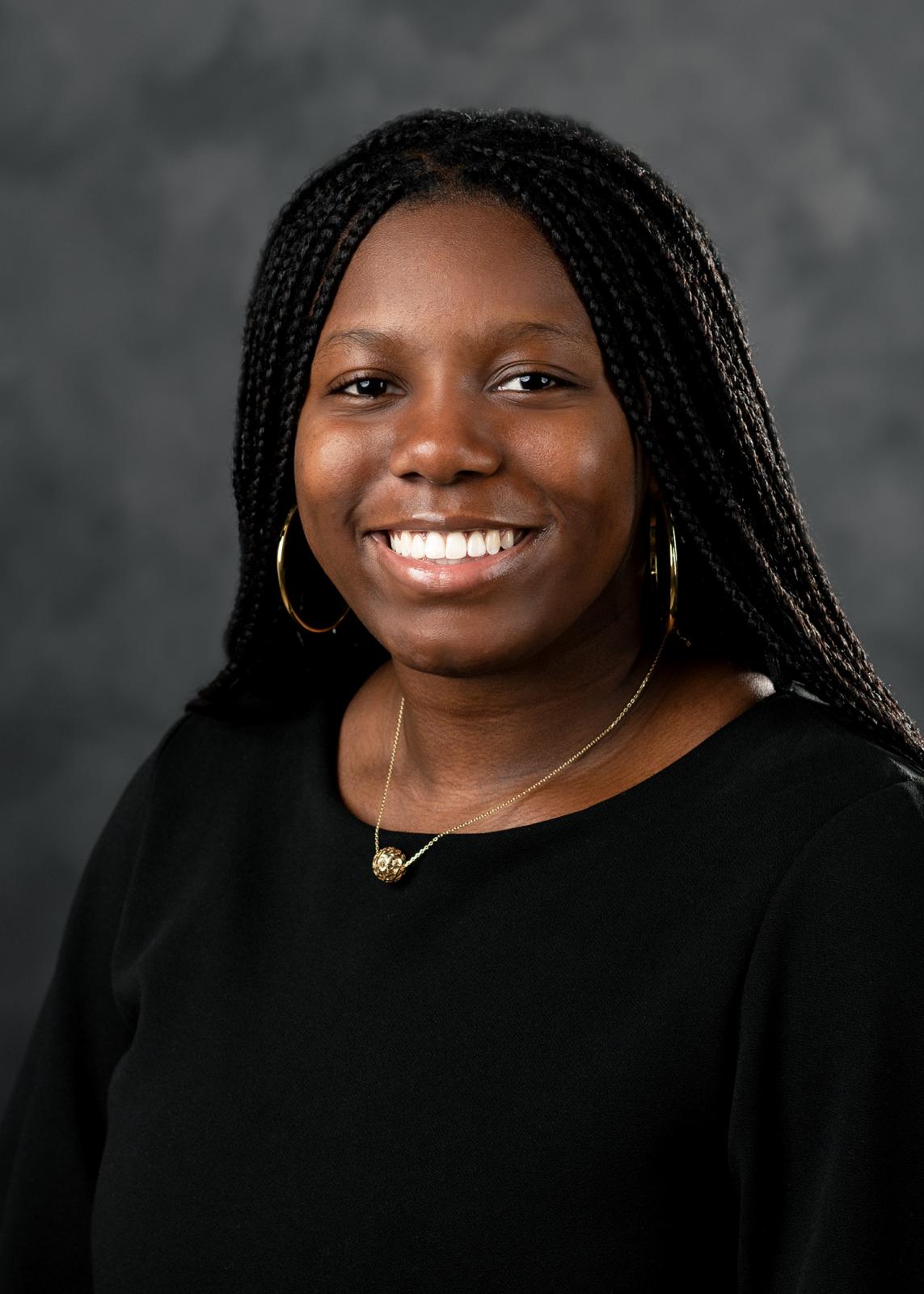 headshot of india white