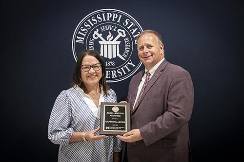 From left: Instructor Cappe Hallberg, School of Human Sciences, CALS Excellence in Advising Award winner, with Scott Willard, CALS dean, MAFES director and interim vice president for research and economic development.