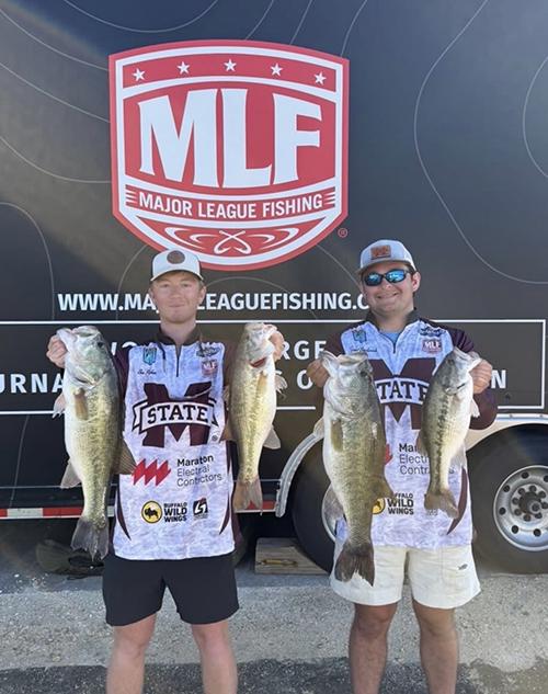 Mississippi State club sports bass fishing team members Ben Puckett, left, and James Broderick show off the four fish that landed them a 15th-place finish at a Columbia PFG College Fishing event held recently at Lake Eufaula in Alabama.