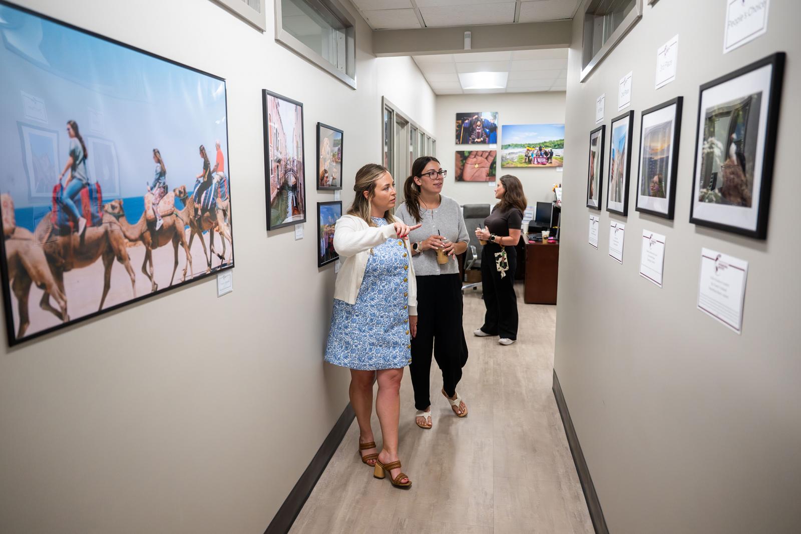 People tour the International Institute space in Walker Hall