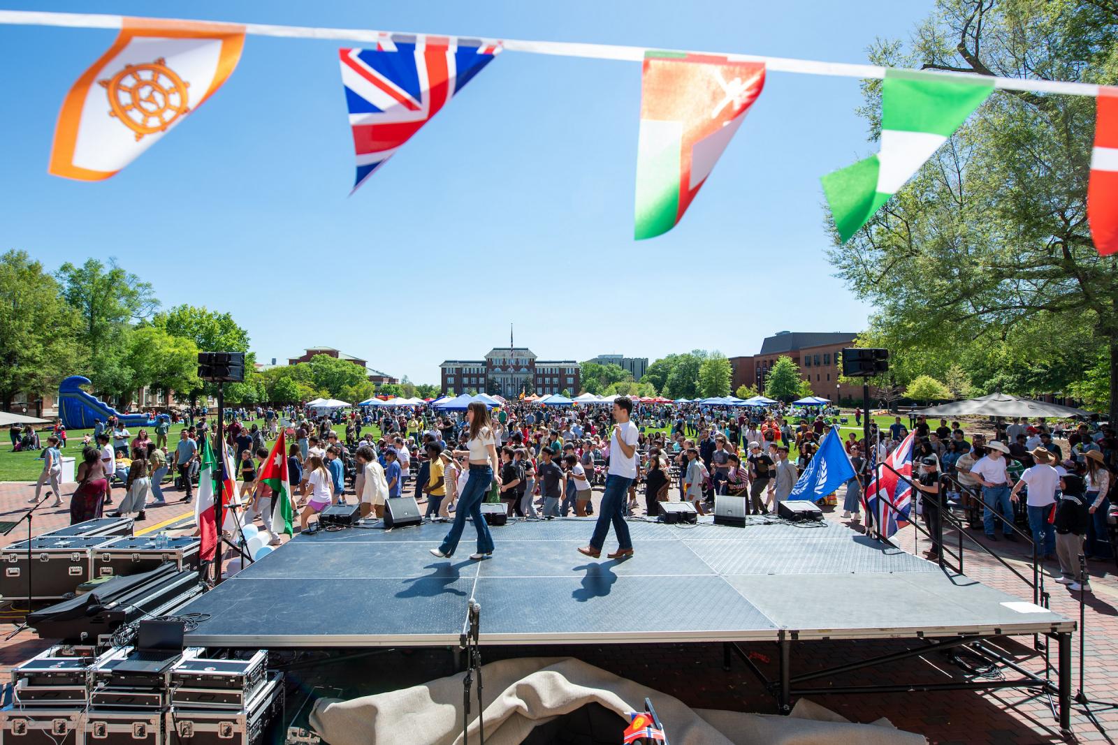 two people dance on stage