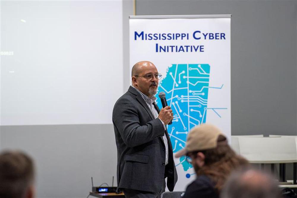 Martin Rivera, director of the Mississippi Cyber Initiative, speaks during a recent summit at Mississippi State focused on digital forensics.