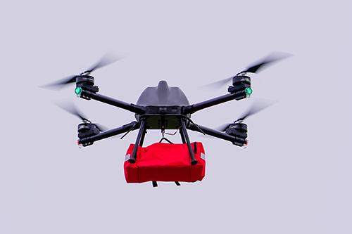 A Talon uncrewed aircraft system donated to Mississippi State’s Raspet Flight Research Laboratory by the COLSA Corp., carries a payload during flight.