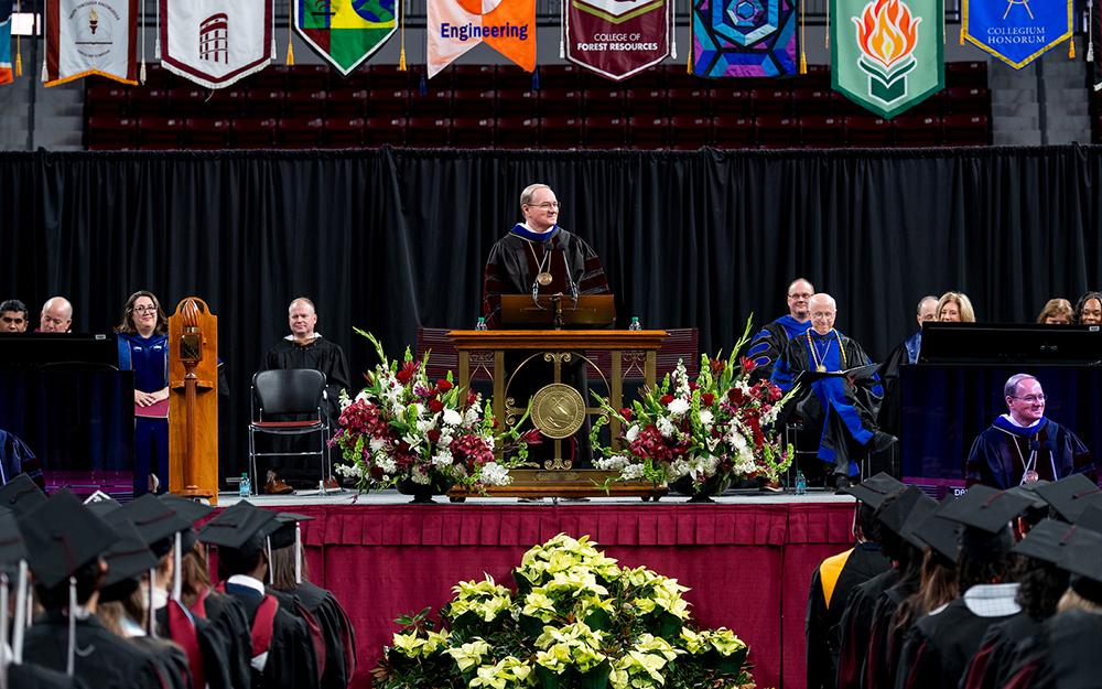 Mississippi State President Mark E. Keenum speaks on stage during commencement ceremonies.