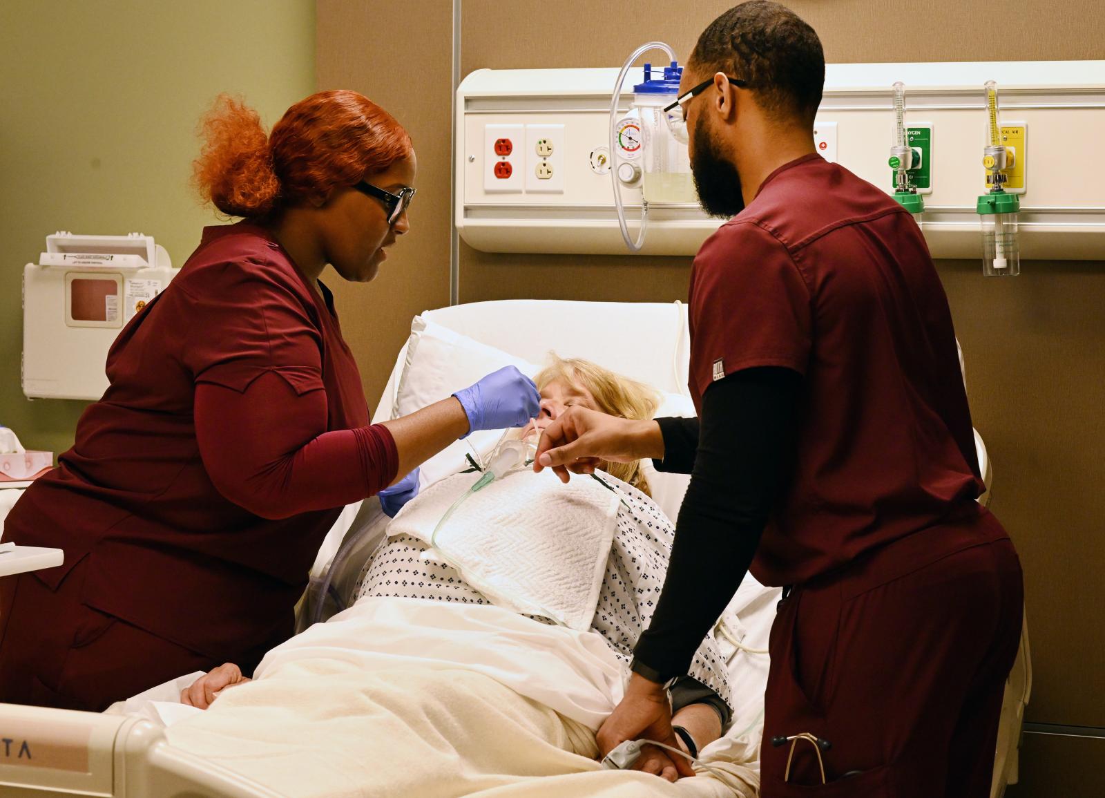 Two MSU-Meridian students working in simulation lab