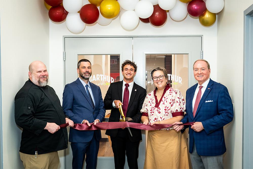 Pictured cutting a ribbon, from left, are MSU Dining Chef Greg D. Huerkamp; Resident District Manager for MSU Dining Services James Jankowski; Student Association President Keegan Figueroa; Vice President for Student Affairs Regina Hyatt; and MSU President Mark E. Keenum.