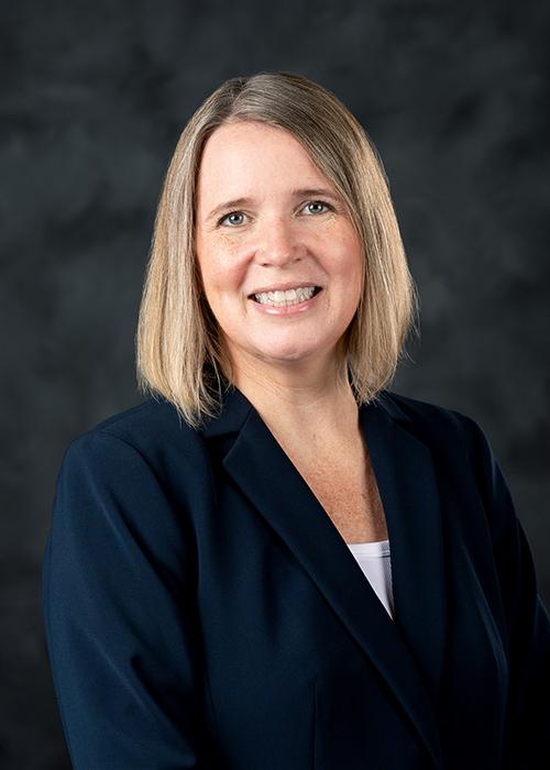 A portrait of Kristine Evans.