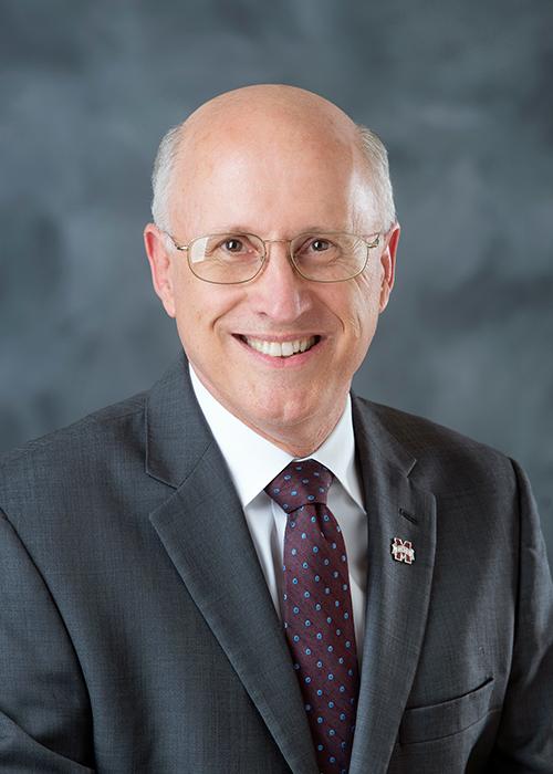 A portrait of David Shaw.